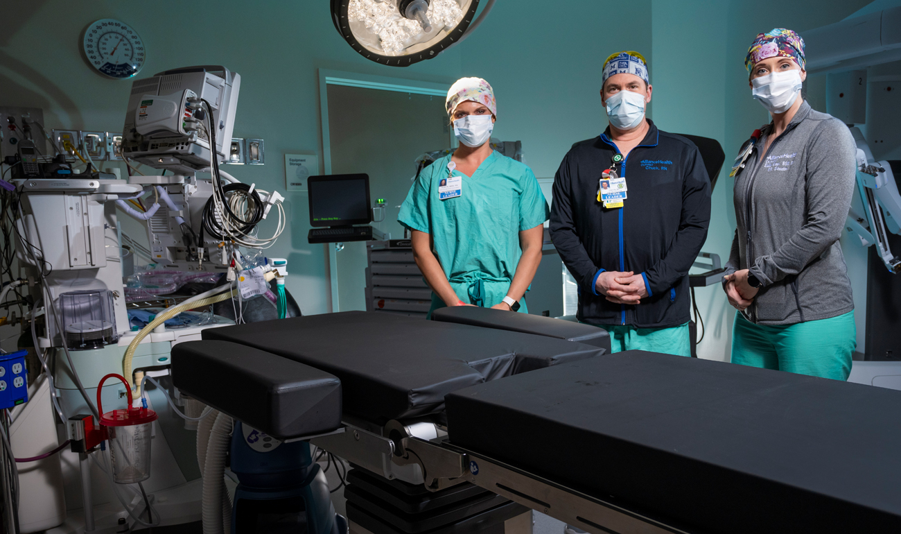 Alliance Health doctors posing in operating room